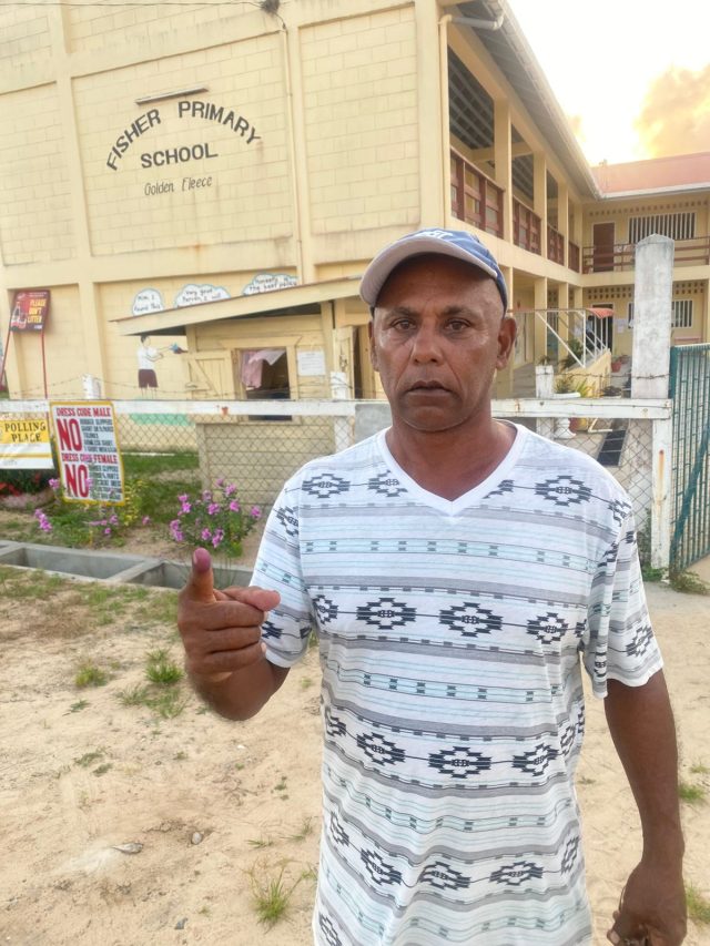 This voter shows off his inked finger