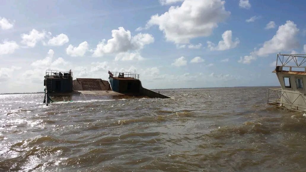 Two crew members missing after molasses barge sinks off East Coast Demerara